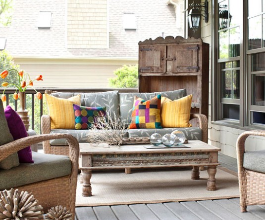 patio furniture-gray sofa and colorful pillows