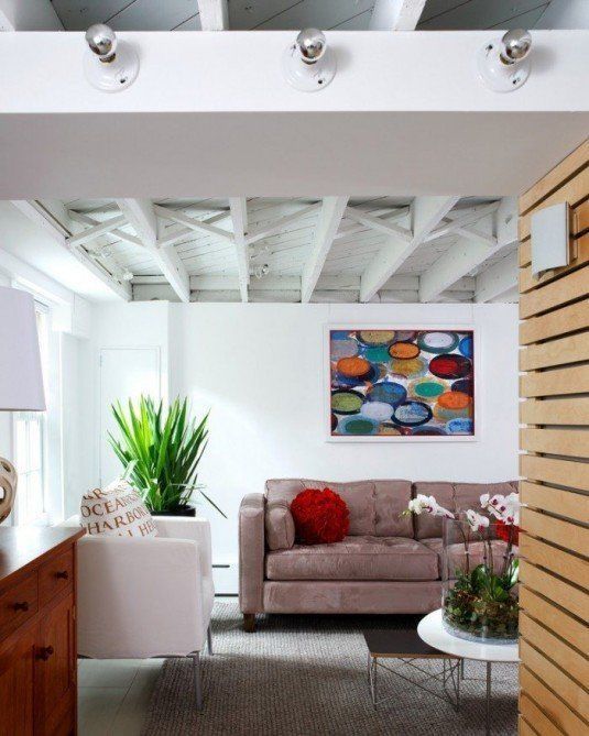 basement-blanket-insulation-Basement-Modern-with-armchair-Art-coffee-table-700x875