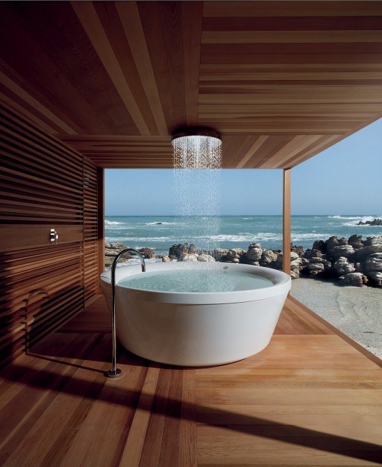 bathroom-furniture-zucchetti-kos-geo-180-outdoor-freestanding-white-round-bathtub-with-floor-stand-gooseneck-tub-faucet-and-ceiling-mounted-round-rain-shower-modern-bathroom-furniture-and-accessories