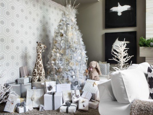 2013 Holiday House features an eight-foot-tall artificial tree completely decorated in shades of white, cream, dove gray and silver.