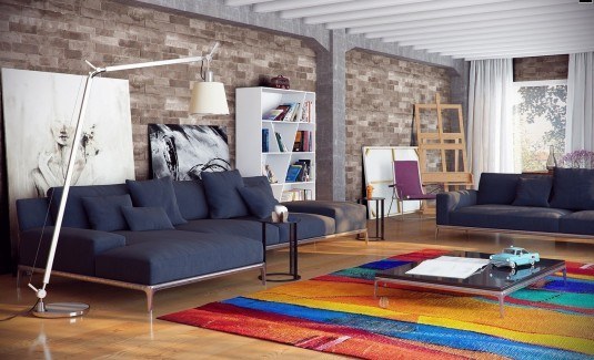 Brick-Wall-City-Loft-Contemporary-Living-Room-with-Cozy-Blue-Sofa-and-Colorful-Rug