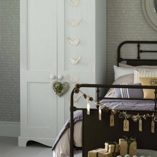 Rustic Christmas bedroom, pale blue wardrobe.