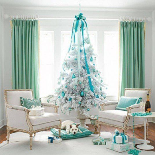 Christmas is so much fun, specially when one can keep getting newer ideas for inspiration each year! Here there are four set of themes, decor ideas in different colors to inspire you.Christmas decoration in White and Green. Colorful theme designs with stunning looks.White Christmas tree and Teal blue color! For those looking for really unique decoration ideas this Christmas. This set of pictures have lots of stunning bright colors and they make for some really beautiful decoration this Christmas. Another Retro modern look for Christmas decoration. The color scheme is White + Orange + Green with Blue as the accent color. All of the looks above simply show how one can keep using new colors and schemes for Christmas decoration year after year.