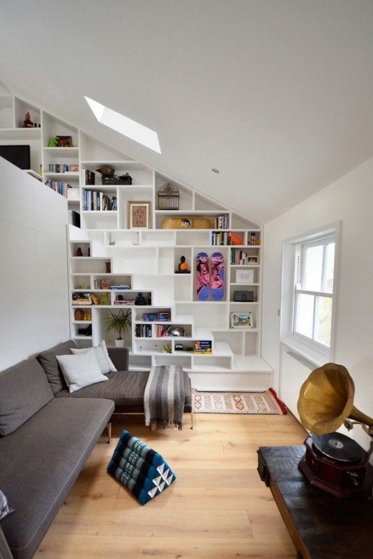 foxy-white-loft-storage-staircase-with-gray-sofa-and-shelf-under-stairs-unique-and-creative-stair-design-that-feature-space-saving-ideas-space-saving