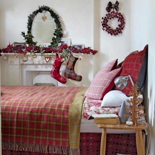 White bedroom, fireplace, bed with tartan blanket, men's slippers, stainless steel anglepoise lamp, berry wreath, stockings, berry garland, wooden side table, IH Complete Guide to Christmas 2012 Pub Orig