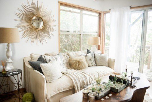 Cozy-living-room-with-pillows-and-plants