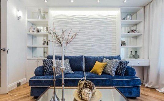 Modern-blue-sofa-in-the-white-living-room