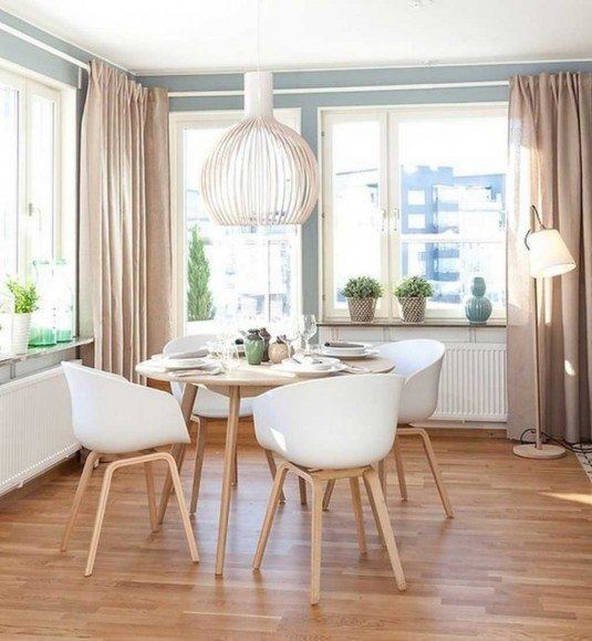 Soothing-Dining-Room-Ideas-For-Beach-House-With-Natural-Laminated-Wooden-Flooring-Design-And-Creative-White-Pendant-Lamps-Ideas-Also-Modern-Circle-White-Wooden-Dining-Table-Design