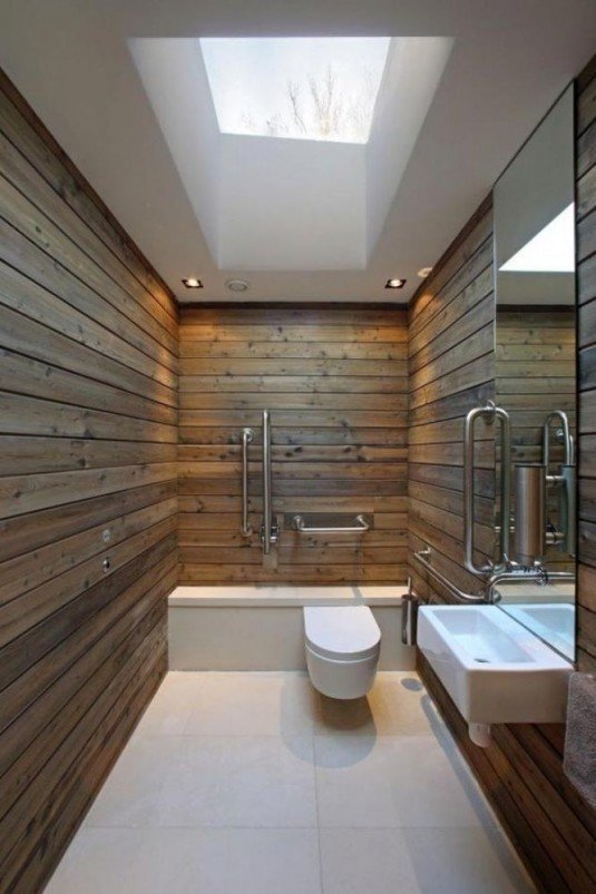 outstanding-bathroom-design-with-ebony-wood-wall-minimalist-sink-vanity-and-glass-roof