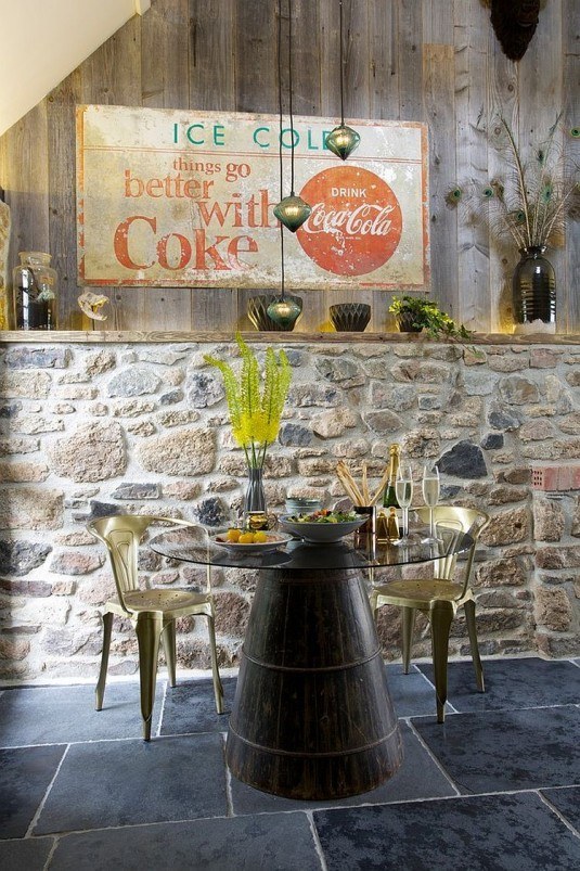 Fabulous-eclectic-dining-room-with-distressed-wood-and-stone-wall