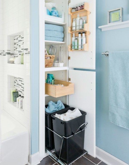 small-bathroom-storage-ideas-with-hiden-bathroom-cabinet-besides-wall-mounted-towel-warmer-on-blue-color-paint-bathroom-wall-ideas