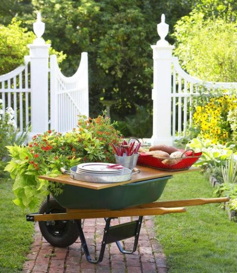 54fe38be234a5-wheelbarrow-garden-white-fence-0611-xl