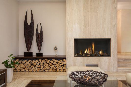 nice-interior-fireplace-wood-storage-on-dark-brown-wooden-table-with-cozy-rest-room