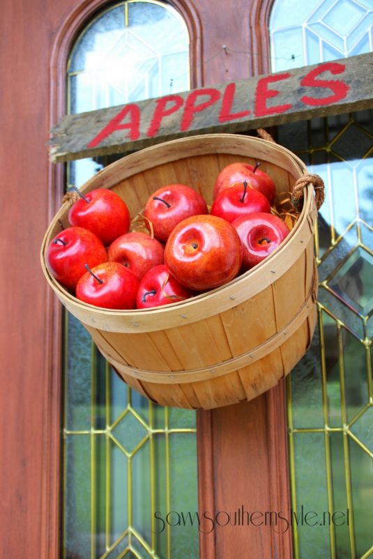 diy-projects-ideas-fall-wreaths-hang-a-bushel-basket-of-apples-on-the-door-idea-via-savvy-southern-style