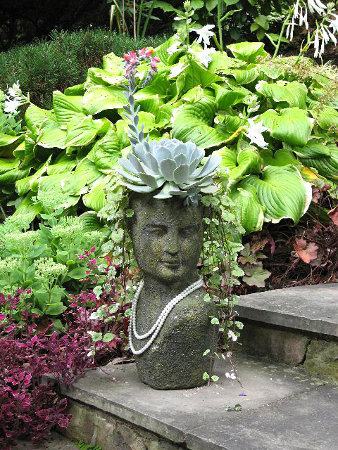 dazzling head planters will add some fun to your garden