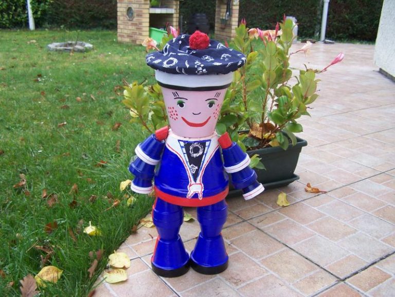 Cheap DIY Clay Pot People To Cheer Up Your Garden